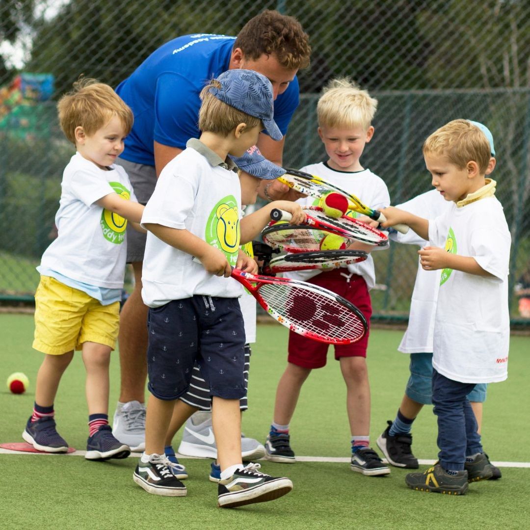 Kids getting their rackets